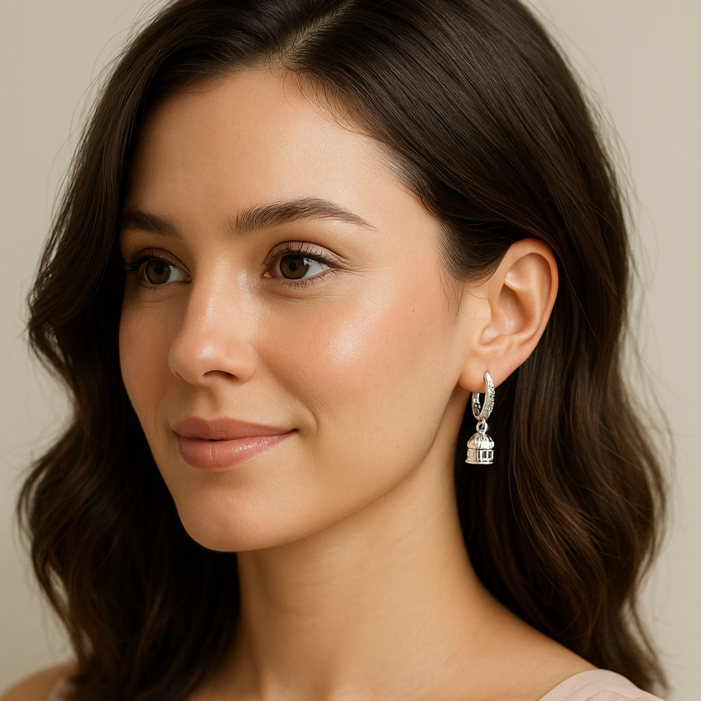 Woman wearing earrings with a neutral background